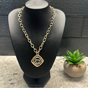 Bella Gold Necklace with Pale Dark Blue Gemstone